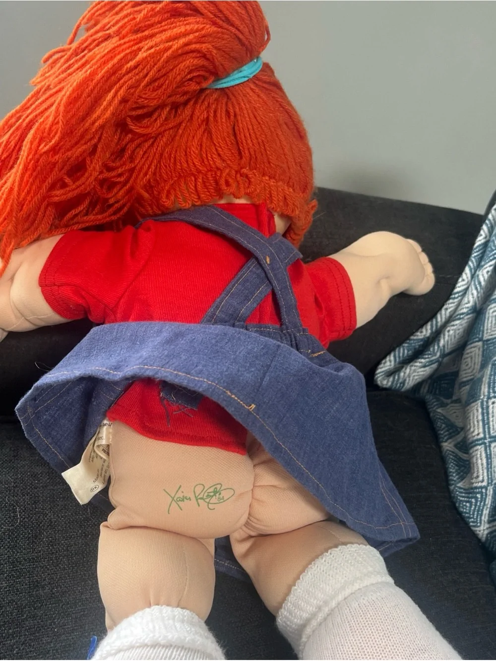 Orange-Haired  Cabbage Patch  Kids Doll with Blue Eyes has tooth retainers